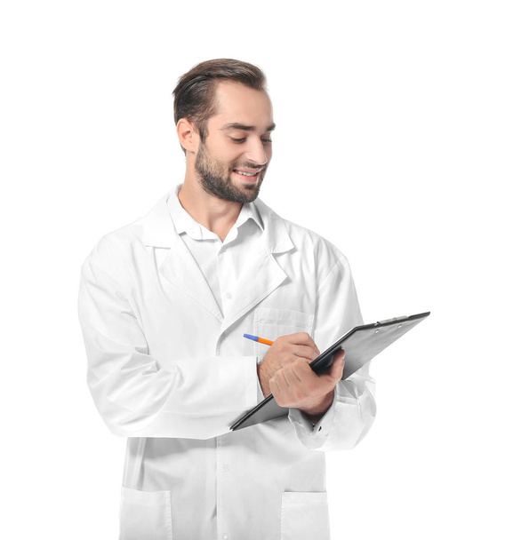 Young pharmacist with clipboard  - Zdjęcie, obraz
