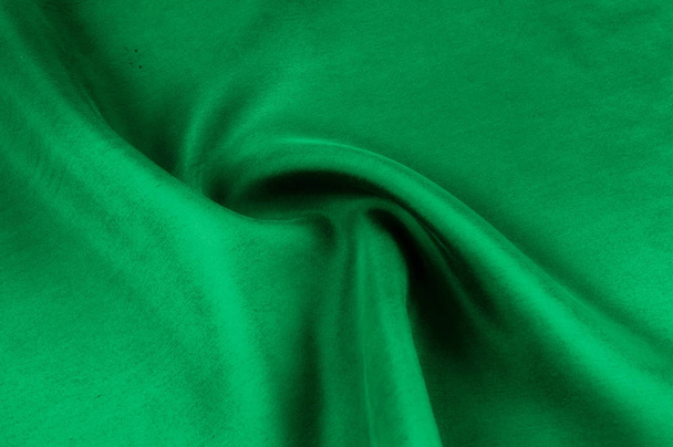 Background texture, pattern. Thick thick silk fabric is green. T - Photo, Image