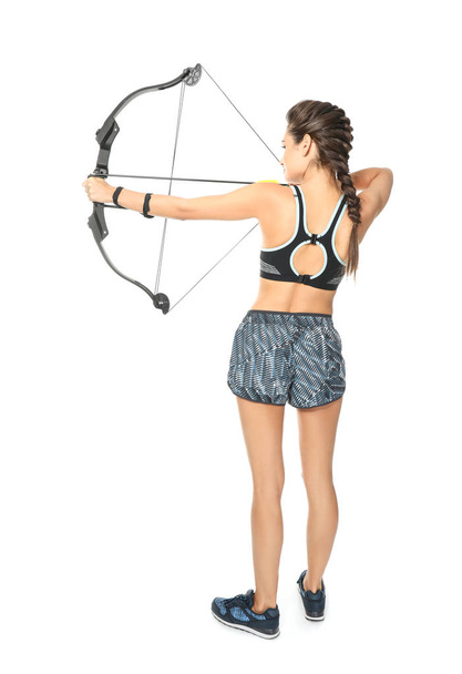 young woman practicing archery - Zdjęcie, obraz