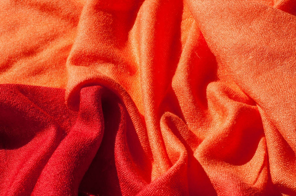Texture, background, pattern. Red woolen female scarf - Photo, Image