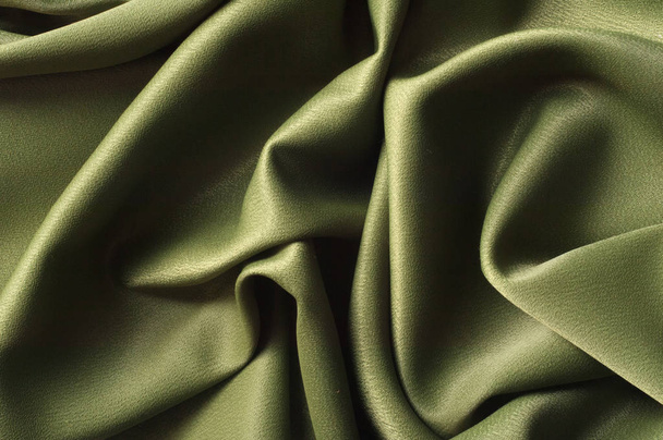 Texture, background. template. Cloth silk green, crepe de Chine. a fine crepe of silk or similar fiber. - Foto, Imagen