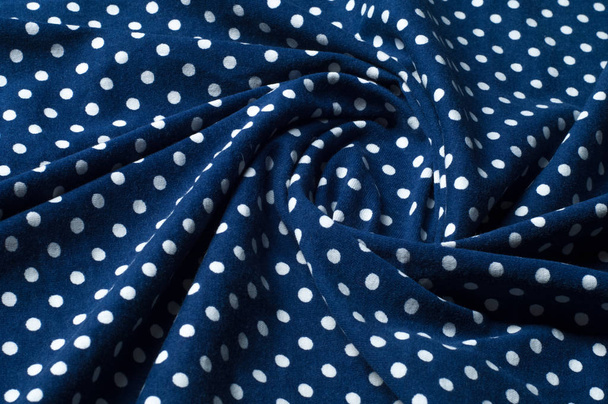 Texture. Background. Drawing. Fabric silk blue in white peas - Фото, зображення