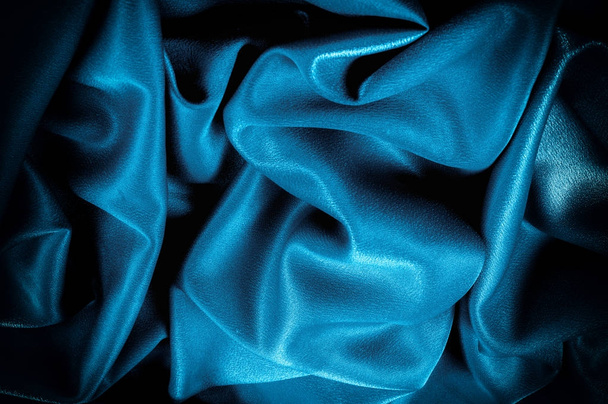 Texture, background. template. Silk fabric blue, Blue silk drapery and upholstery fabric from the courtyard - Dark curtains - Solid fabrics for backs and pillows - Foto, afbeelding
