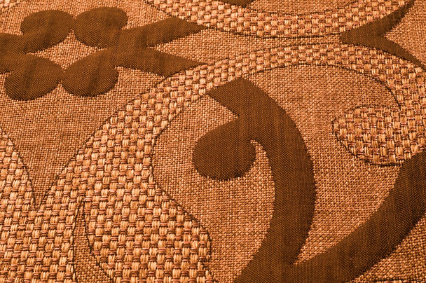 Tekstuuri, tausta, kuvio. Kangas Tweed puuvilla kullanruskea kukka kuvio
 - Valokuva, kuva