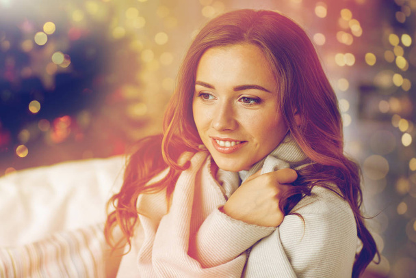 happy young woman with plaid at home for christmas - Foto, Imagem