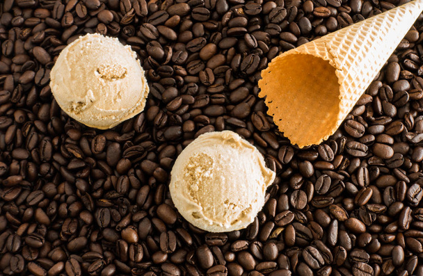 Scoops of Coffee Ice Cream and Cone on Coffee Beans 1 - Photo, Image