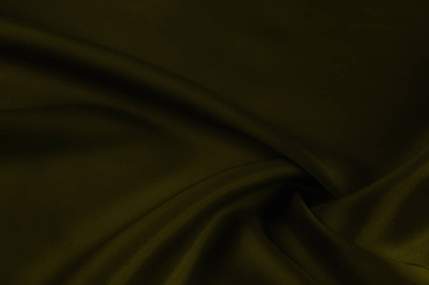 Soft focus. texture, pattern. cloth silk yellow. Mustard washed Silk Crepe de Chine. Bright mustard fabric is an ultra soft, silky hand. As the drapery folds, create sites, your designs, much more! - Foto, imagen