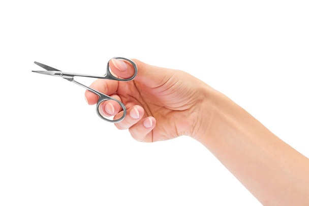 manicure scissors in hand isolated on white background - Fotoğraf, Görsel