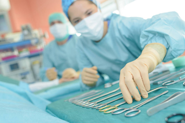 sterile surgical instruments on the table - Photo, image