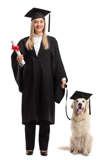 female student with a diploma and a dog wearing a graduation hat - Foto, Imagem
