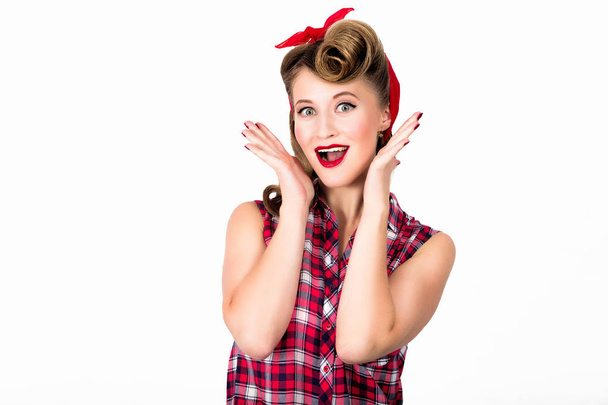 Happy and surprise beautiful young woman with pin-up make-up and hairstyle - 写真・画像
