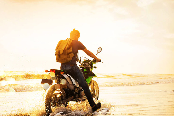 man riding a motorbike - 写真・画像