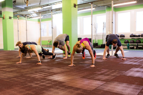 group of people exercising in gym - Zdjęcie, obraz
