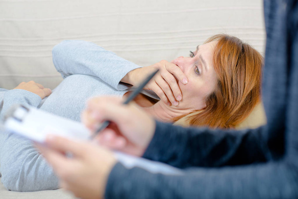 female depressed during psychotherapist consultation - Фото, изображение