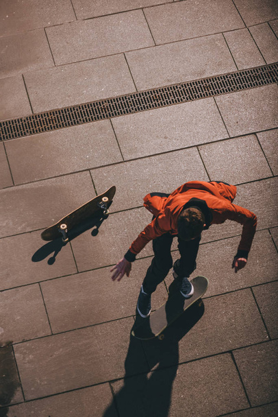 high angle view of skateboarder preparing for trick - Photo, Image