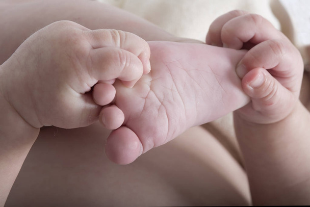 baby arms hand, legs and foot - Photo, Image