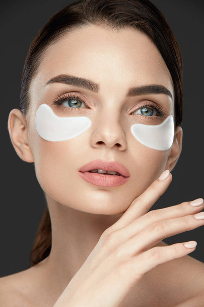 Beauty Skin Care. Beautiful Female Face With Eye Patches - Foto, Imagem