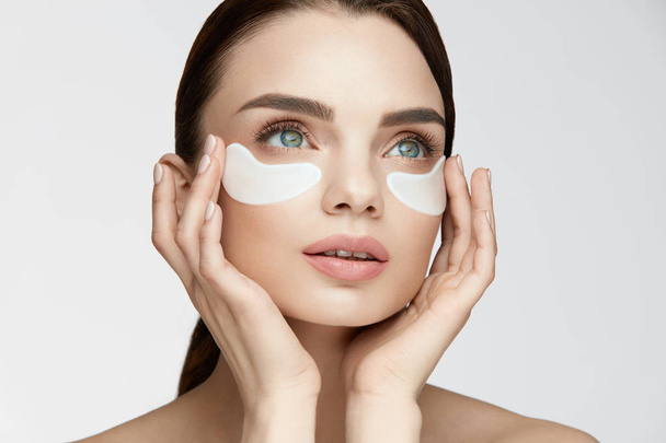 Eye Skin Treatment. Woman With White Under Eye Patches On Face - Photo, Image