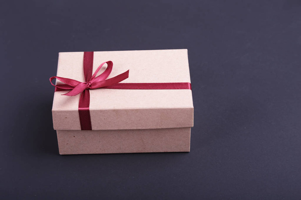 Gift boxes with bow on wood background - Fotoğraf, Görsel