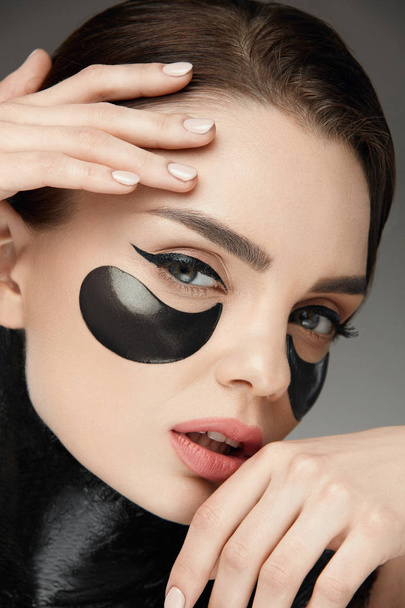 Fashion And Beauty. Female Face With Mask And Patches Under Eyes - Foto, Bild