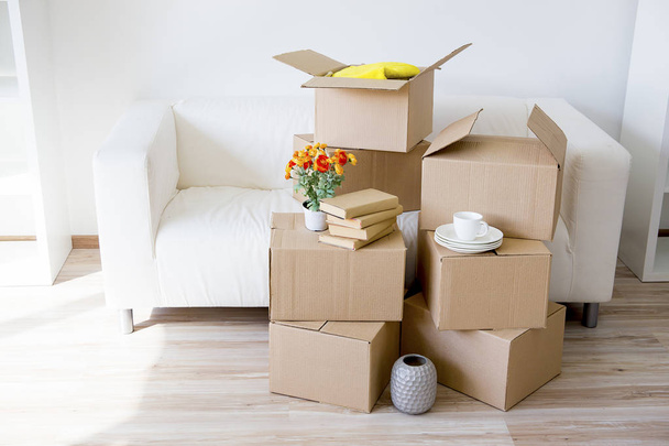Cardboard boxes - moving to a new house - 写真・画像