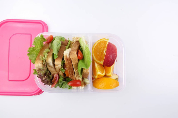 Healthy lunchbox with sandwich and fruits for school chidren. - Fotó, kép