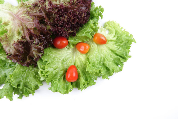 Closeup of a pile of lettuce mix for salad on a white background - Foto, immagini