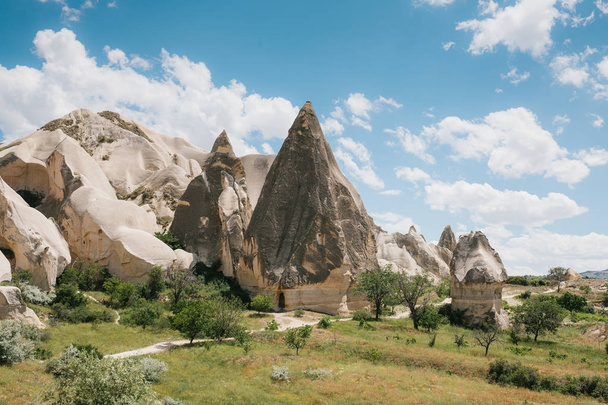 Beautiful view of the hills of Cappadocia. One of the sights of Turkey. Tourism, travel, beautiful landscapes, nature. - Photo, image