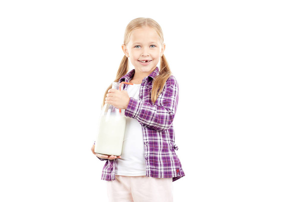 Girl with milk bottle - 写真・画像