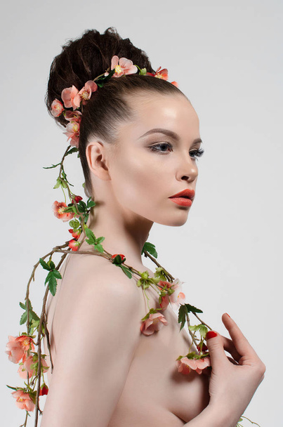 nude beautiful woman in flowers - Photo, Image