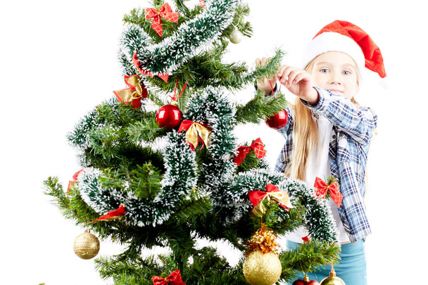 Decorating Christmas tree - Zdjęcie, obraz