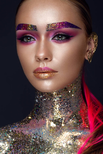Beautiful girl with creative glitter makeup, sparkles, unusual eyebrows. Beauty is an art face. - Fotó, kép