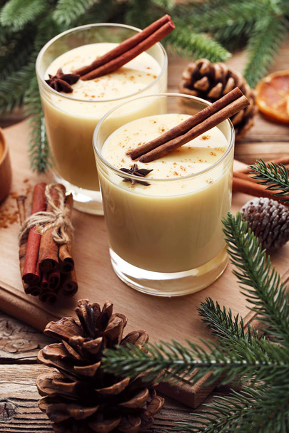 Eggnog in glasses with cinnamon - Photo, image