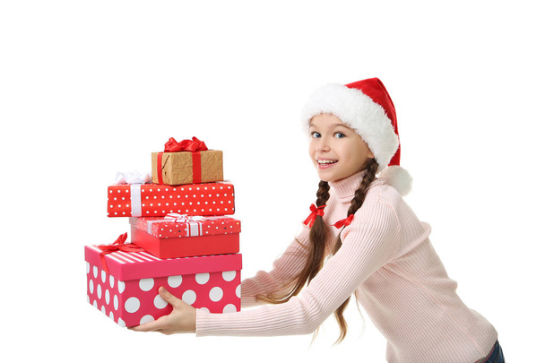 Young beautiful girl holding in hands gift boxes - Фото, зображення