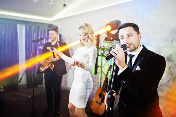 Musicial music live band performing on a stage with different li - Foto, imagen