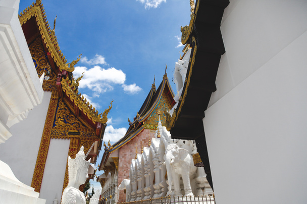 beautiful thai temple in front of clear blue sky - Photo, Image