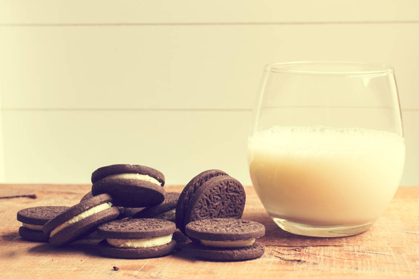 Cookies and a glass of milk - 写真・画像