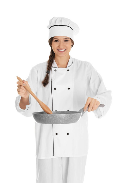 female chef with frying pan and spatula - Фото, зображення