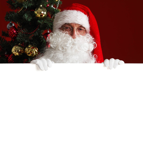 Santa Claus with white paper - Fotografie, Obrázek