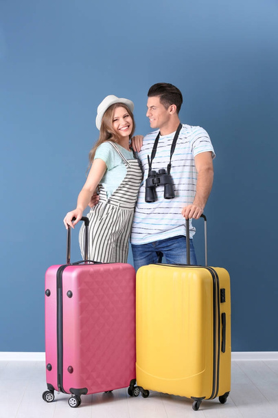 Happy tourists with suitcases - Fotó, kép