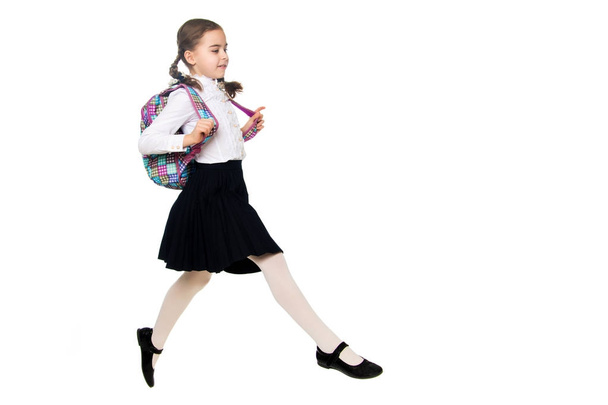 A schoolgirl girl is jumping over obstacles. - Zdjęcie, obraz