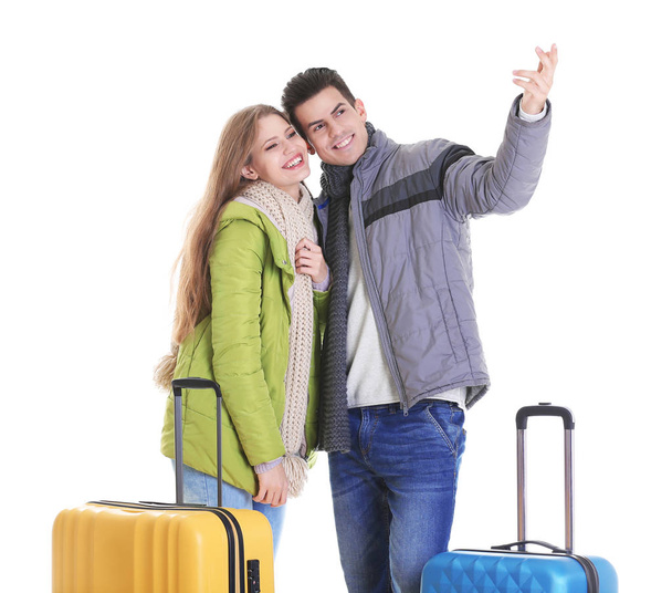 Happy tourists with suitcases - Valokuva, kuva