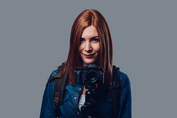 A woman holds photo camera. - Photo, Image