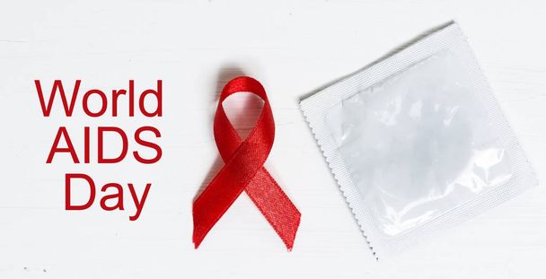Red ribbon - World AIDS day - Zdjęcie, obraz