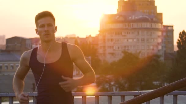 Professional athlete running around in morning, keeping himself in good shape - Materiał filmowy, wideo