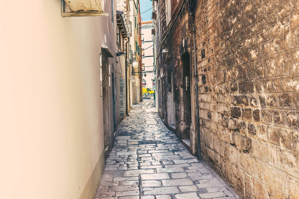 Street view of Sibenik,a popular travel destination for historical architecture,narrow stone streets in Croatia.May 26,2017 - Foto, afbeelding
