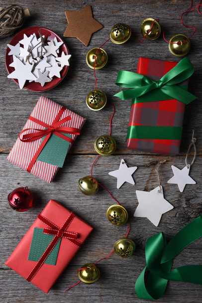 Wrapped Christmas Presents Bells and Stars - Фото, зображення