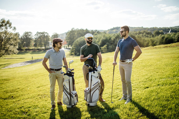 friends spending time on golf course - Foto, immagini