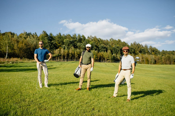 friends spending time on golf course - 写真・画像
