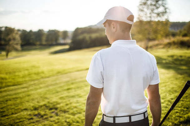 Golf player  on course during summer game golfing - Фото, зображення
